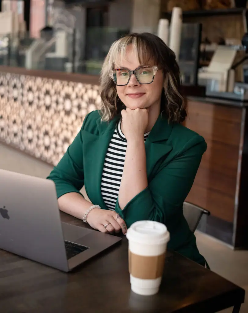 Miranda Flinchum working from café with laptop